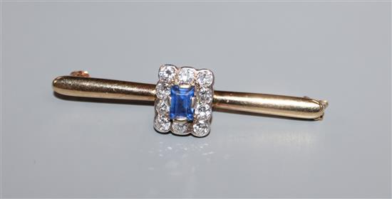 A yellow metal, sapphire and diamond square cluster set bar brooch, 46mm.